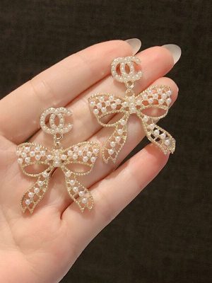 Replica Designer Chanel Women Pearl Butterfly Double C Earrings