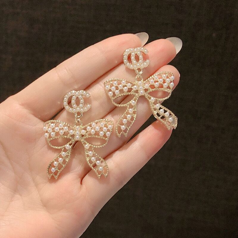 Replica Designer Chanel Women Pearl Butterfly Double C Earrings