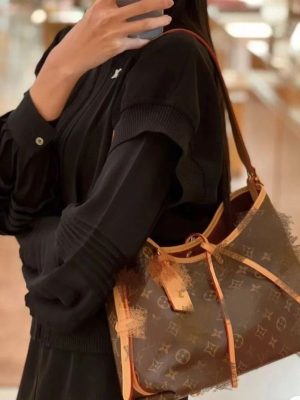 Replica Designer Louis Vuitton Discolored Cowhide Middle-Aged Armpit One-Shoulder Bag